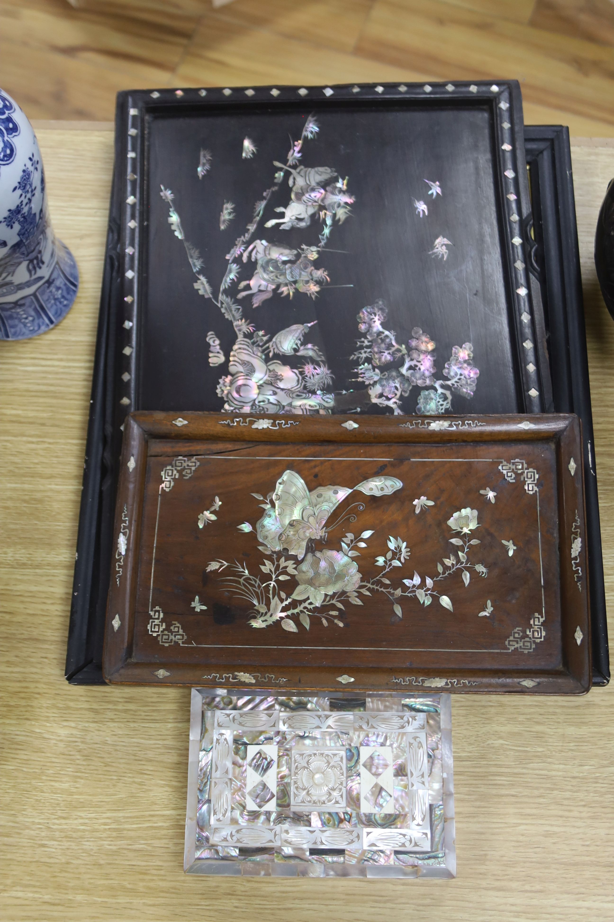 Three Chinese / Japanese mother of pearl inlaid trays together with a mother of pearl and abalone box